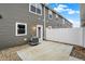 Backyard patio with gray siding and a white privacy fence at 19493 Grassy Branch Rd, Westfield, IN 46074