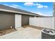 Concrete backyard patio with a white privacy fence and gray siding at 19493 Grassy Branch Rd, Westfield, IN 46074