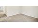 Neutral bedroom featuring plush carpet flooring and a doorway to a hallway at 19493 Grassy Branch Rd, Westfield, IN 46074