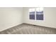 Bedroom with neutral carpet, white walls, double window letting in ample natural light at 19493 Grassy Branch Rd, Westfield, IN 46074