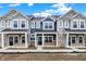 New townhouse exterior displaying brick accents and varied siding and roof lines at 19493 Grassy Branch Rd, Westfield, IN 46074