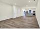 Bright and airy living area connected to a modern, well-equipped kitchen space at 19493 Grassy Branch Rd, Westfield, IN 46074