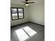 Sunlit bedroom featuring a large window with backyard views, offering a serene and bright living space at 19533 Justin Morgan Dr, Westfield, IN 46074