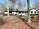 Charming single-story home with mature trees, a well-maintained lawn, and a welcoming front entrance at 19533 Justin Morgan Dr, Westfield, IN 46074