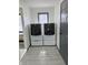 Modern laundry room featuring a pair of LG front load washer and dryer units at 19533 Justin Morgan Dr, Westfield, IN 46074