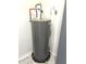 Water heater in a home, with visible piping and connections in a utility area or basement at 19533 Justin Morgan Dr, Westfield, IN 46074