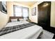 Comfortable bedroom showcasing a cozy bed and traditional style at 2433 Indianapolis Ave, Indianapolis, IN 46208