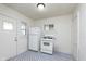 Practical kitchen featuring simple white appliances and patterned flooring at 2433 Indianapolis Ave, Indianapolis, IN 46208
