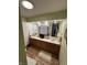 Bathroom featuring double sinks and a large mirror at 28 Cambridge Ct, Anderson, IN 46012