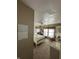 Bedroom with a large bed, calendar on the wall, and a window with blinds at 28 Cambridge Ct, Anderson, IN 46012