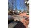 Large deck with furniture, grill, and riding mower at 28 Cambridge Ct, Anderson, IN 46012