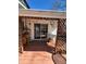 Cozy covered deck with sliding door and lattice accents at 28 Cambridge Ct, Anderson, IN 46012