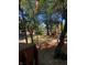View of wooded front yard from the front porch at 28 Cambridge Ct, Anderson, IN 46012