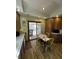 Well-maintained kitchen with wood cabinets and access to the deck at 28 Cambridge Ct, Anderson, IN 46012