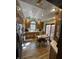 Efficient kitchen with wood cabinets and modern appliances and eat-in nook at 28 Cambridge Ct, Anderson, IN 46012