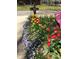 Landscaping with colorful tulips and ground cover at 28 Cambridge Ct, Anderson, IN 46012