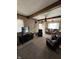 Inviting living room featuring a television, neutral colors, and comfortable seating at 28 Cambridge Ct, Anderson, IN 46012