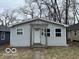 Charming single-story home with gray siding and a simple, well-maintained front yard at 2912 N Gladstone Ave, Indianapolis, IN 46218