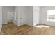 Spacious bedroom with hardwood floors, bright natural light and ample closet space at 35 N Keystone Ave, Indianapolis, IN 46201