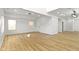 Spacious living room with sleek, modern lighting, and lots of natural light at 35 N Keystone Ave, Indianapolis, IN 46201