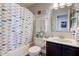 Neutral bathroom with a fish themed shower curtain at 4042 Eagle Cove East Dr, Indianapolis, IN 46254