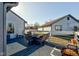 Charming deck area with dark wood flooring, patio seating, and white railing at 4042 Eagle Cove East Dr, Indianapolis, IN 46254