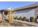 Inviting front exterior with garden landscape and welcoming entrance at 4042 Eagle Cove East Dr, Indianapolis, IN 46254