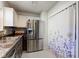 Kitchen featuring stainless steel appliances, tiled backsplash, and granite countertops at 4042 Eagle Cove East Dr, Indianapolis, IN 46254