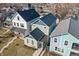 An aerial shot showcasing a group of homes with varying roof colors and architectural styles at 418 Sanders St, Indianapolis, IN 46225