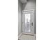 Back door with glass window for natural light and easy access to outdoor area at 418 Sanders St, Indianapolis, IN 46225