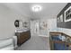 Calming Bedroom with crib, changing table, neutral tones, and modern decor at 418 Sanders St, Indianapolis, IN 46225