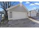 A two car garage with ample space for vehicles and storage at 418 Sanders St, Indianapolis, IN 46225