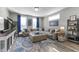 Bright living room boasting a sectional, area rug, and stylish accents at 418 Sanders St, Indianapolis, IN 46225