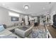 Open-concept space connecting living room and kitchen offers modern design and comfort at 418 Sanders St, Indianapolis, IN 46225