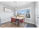 Cozy dining area with a modern table and natural light at 4544 W Rising Sun Dr, New Palestine, IN 46163