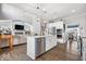 Spacious kitchen with stainless appliances, a large island and access to the dining and living areas at 4544 W Rising Sun Dr, New Palestine, IN 46163