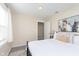 Relaxing bedroom featuring neutral tones, artwork, and ample natural light at 4629 Indianola Ave, Indianapolis, IN 46205