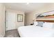 Inviting bedroom showcasing a barn-themed artwork and a serene and comfortable setting at 4629 Indianola Ave, Indianapolis, IN 46205
