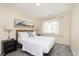 Bright bedroom boasts ample natural light and tasteful decor creating a serene retreat at 4629 Indianola Ave, Indianapolis, IN 46205
