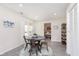 Cozy dining area with a round table, stylish chairs, and easy access to an outdoor deck at 4629 Indianola Ave, Indianapolis, IN 46205