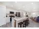 Contemporary kitchen offering a large island with seating, stainless steel appliances, and an open layout at 4629 Indianola Ave, Indianapolis, IN 46205
