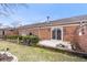 Brick home with a patio and fenced yard is perfect for outdoor enjoyment and entertaining guests at 504 Bent Tree Ln, Indianapolis, IN 46260