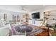 Bright living room with modern furniture and decor and a sliding glass door at 504 Bent Tree Ln, Indianapolis, IN 46260