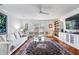 Bright living room with modern furniture, a sliding glass door and lots of natural light at 504 Bent Tree Ln, Indianapolis, IN 46260