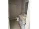 Neutral bathroom featuring a toilet, vanity with cabinets, and tile flooring at 504 Elkhart Dr, Westfield, IN 46074