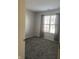Bedroom with gray carpet, light gray walls, a window with blinds and gray curtains at 504 Elkhart Dr, Westfield, IN 46074