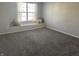 Bedroom featuring a built-in window seat with accent pillows and carpeted flooring at 504 Elkhart Dr, Westfield, IN 46074