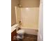 Bathroom featuring a shower-tub combo, toilet, and vanity with a sink at 5822 Blackley Ln, Indianapolis, IN 46254