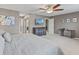 Spacious main bedroom features a ceiling fan, carpet, and a dresser at 5839 Beacon Cove Way, Indianapolis, IN 46237