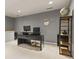 Home office with neutral carpet, sleek black desk, and a globe at 5839 Beacon Cove Way, Indianapolis, IN 46237
